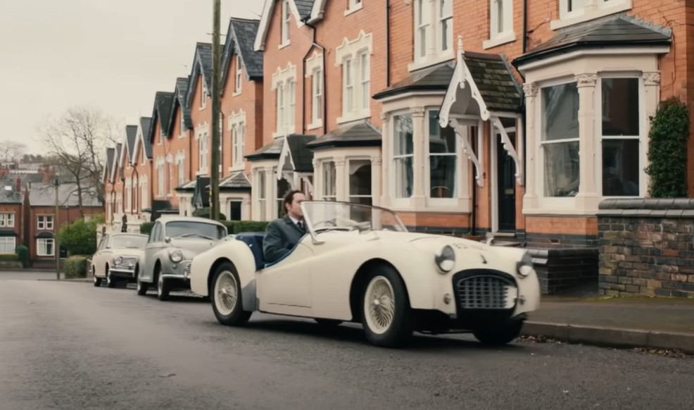 Matthew Macfadyen as John Stonehouse in a white car