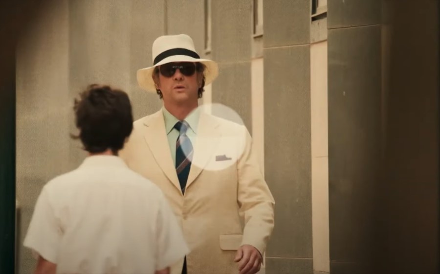 Matthew Macfadyen as John Stonehouse in white suit and hat