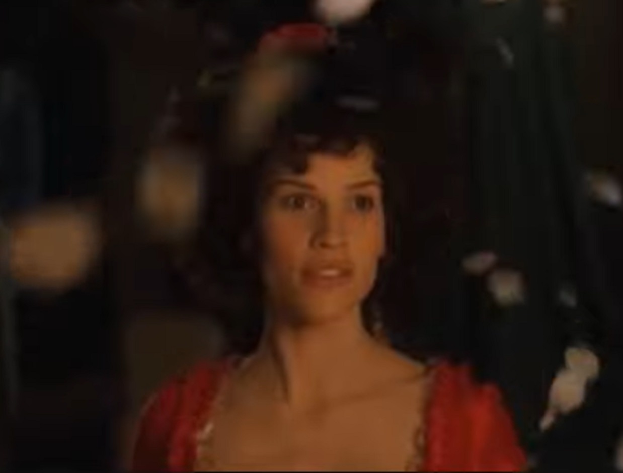 Screenshot: Jeanne St. Remy de Valois wearing red dress is looking at side - from The Affair of the Necklace (2001)