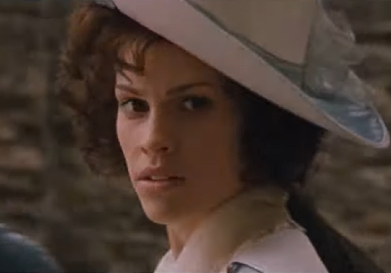 Screenshot: Jeanne St. Remy de Valois wearing white dress and hat is looking at side - from The Affair of the Necklace (2001)