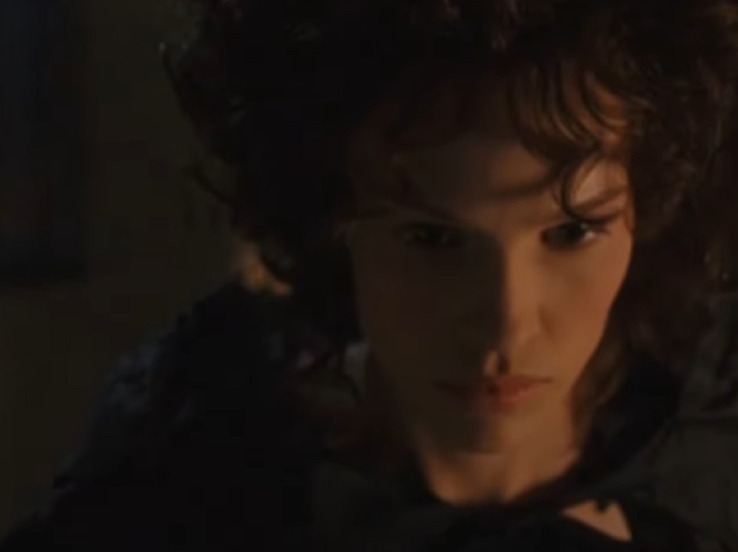 Screenshot: Jeanne St. Remy de Valois in black dress is looking down - from The Affair of the Necklace (2001)