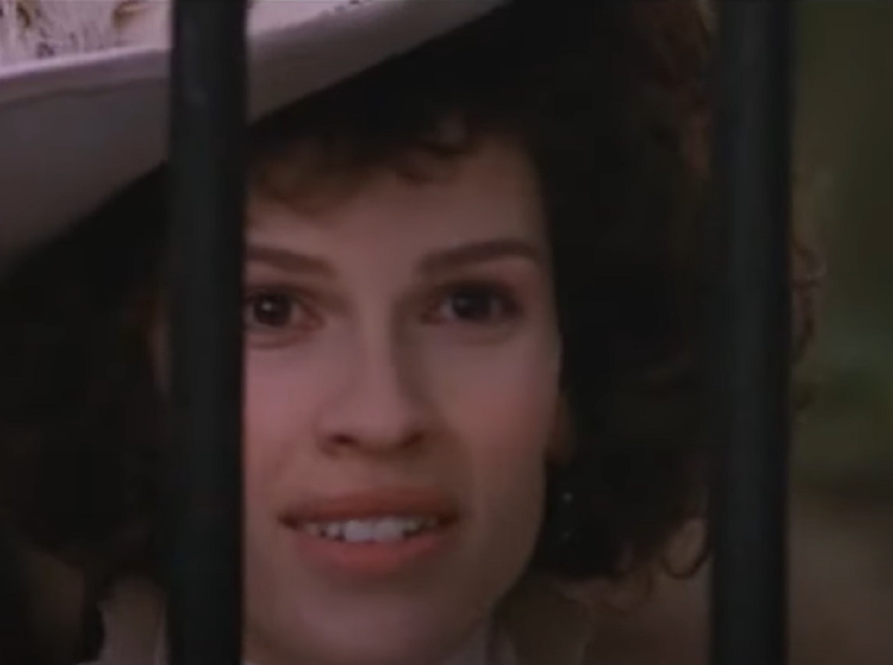 Screenshot: Jeanne St. Remy de Valois wearing hat and smiling - from The Affair of the Necklace (2001)