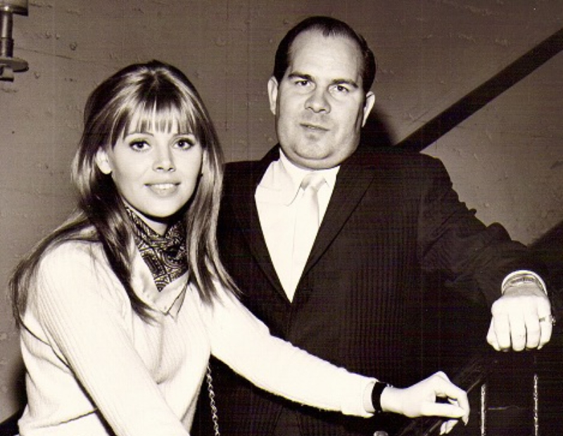 Producer Leroy Griffith and actress Britt Ekland in stairs