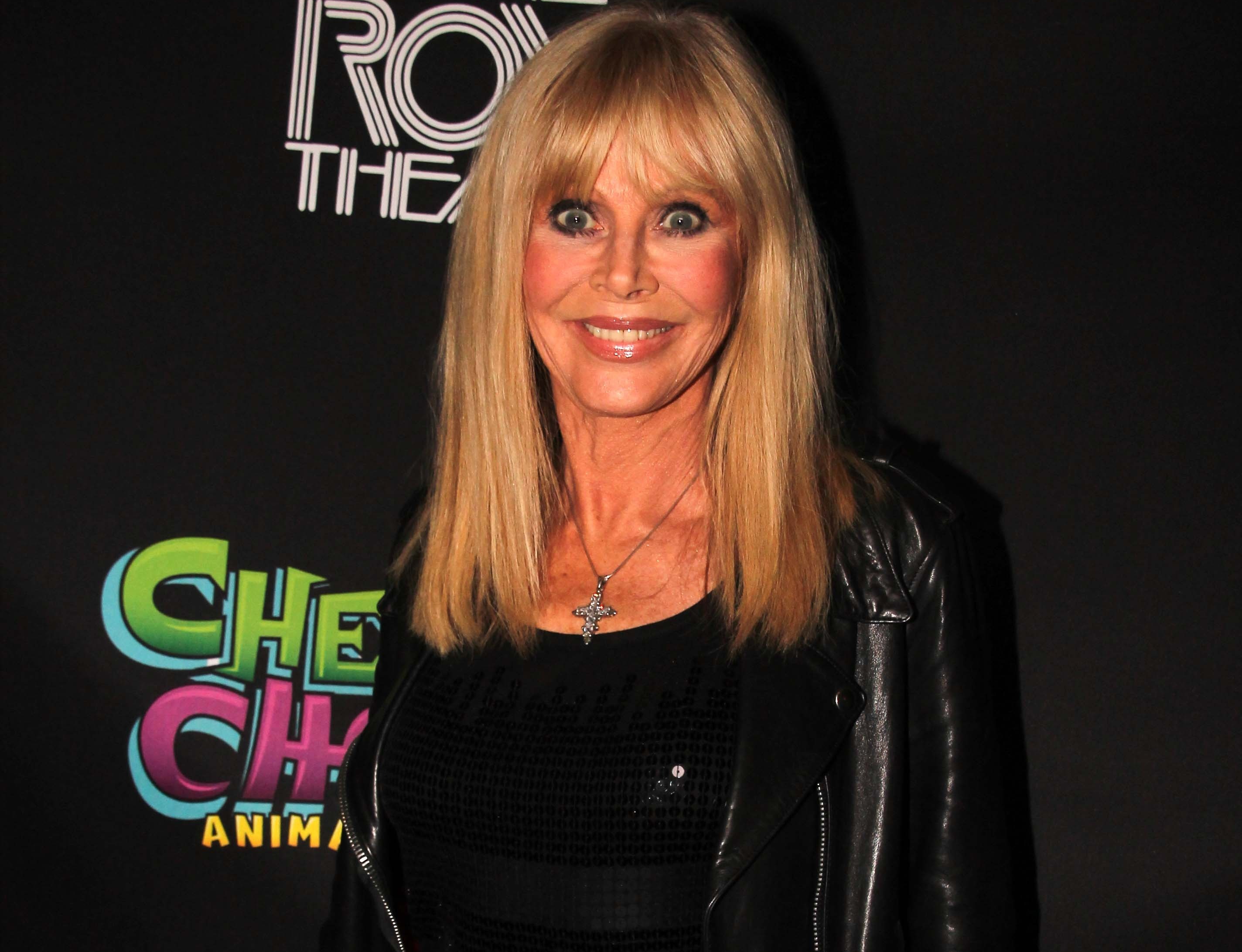 Britt Ekland in black top