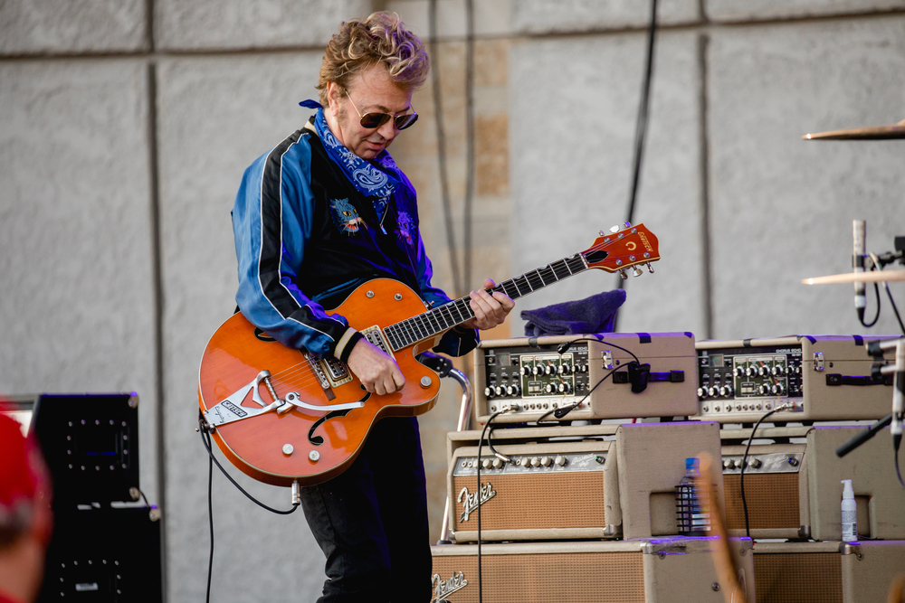 slim jim phantom playing a guitar