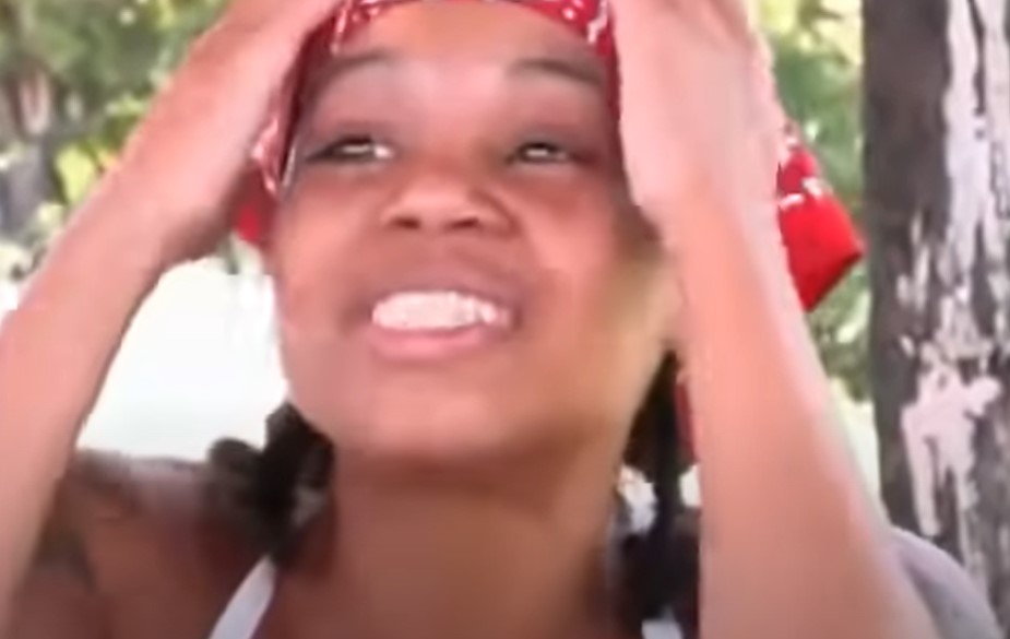 Lisa Left Eye Lopes wearing a hair scarf