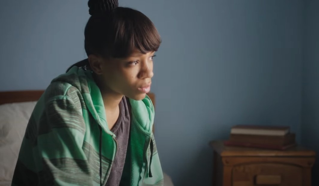 Lil Mama	as Lisa Left Eye in green sweatshirt