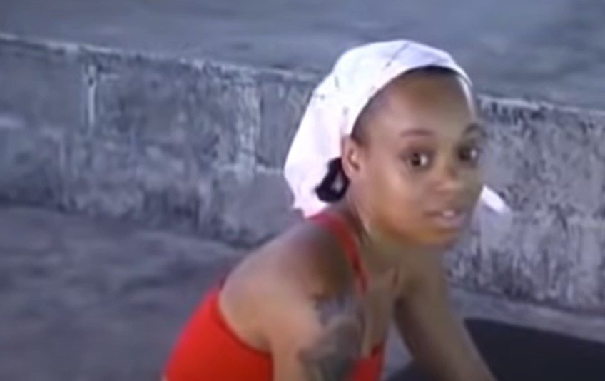 Lisa Left Eye Lopes in red top