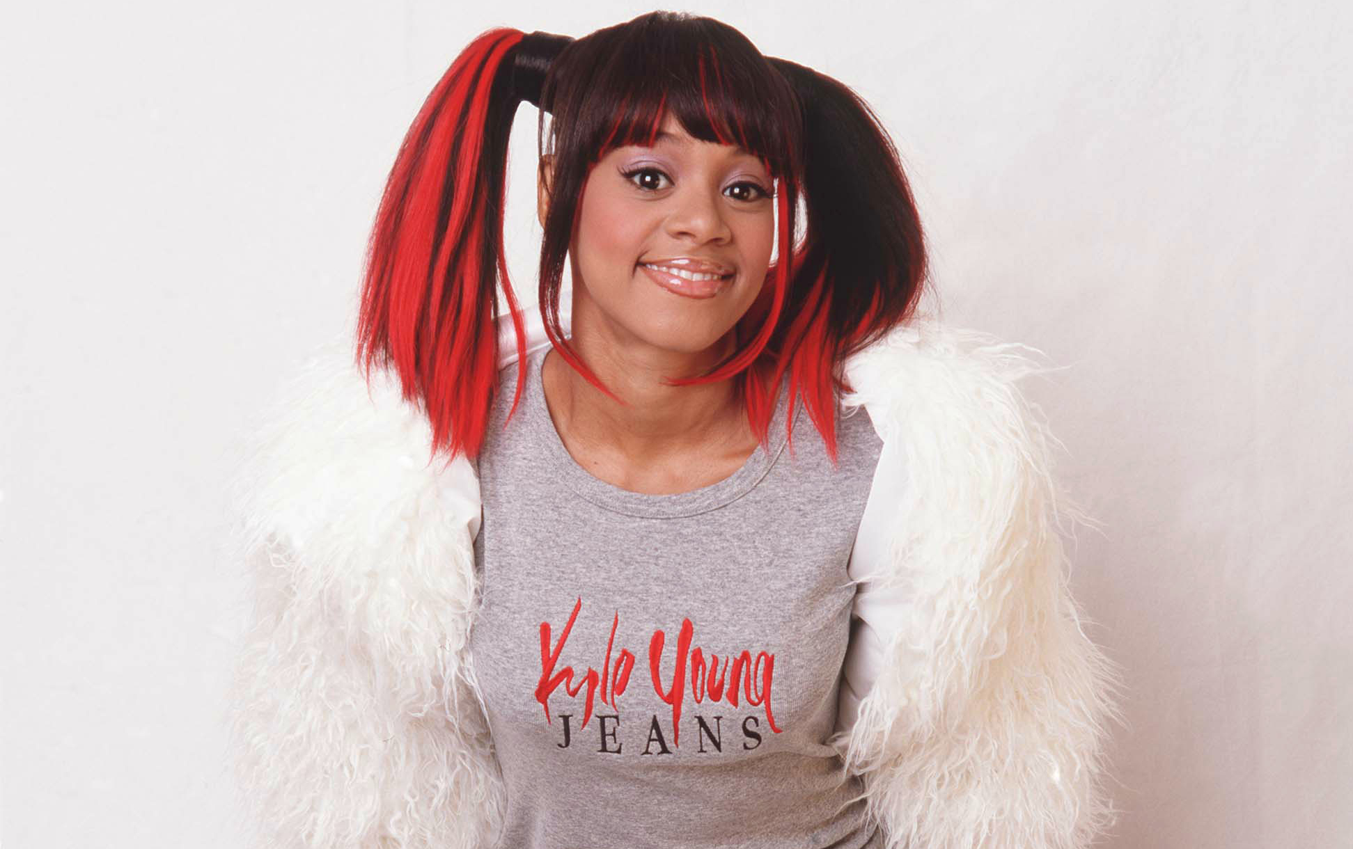 Lisa Left Eye Lopes from TLC in gray top