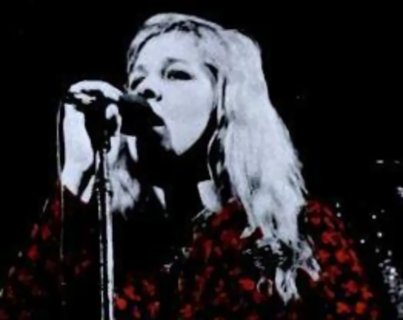 Sandy Denny in red and black top