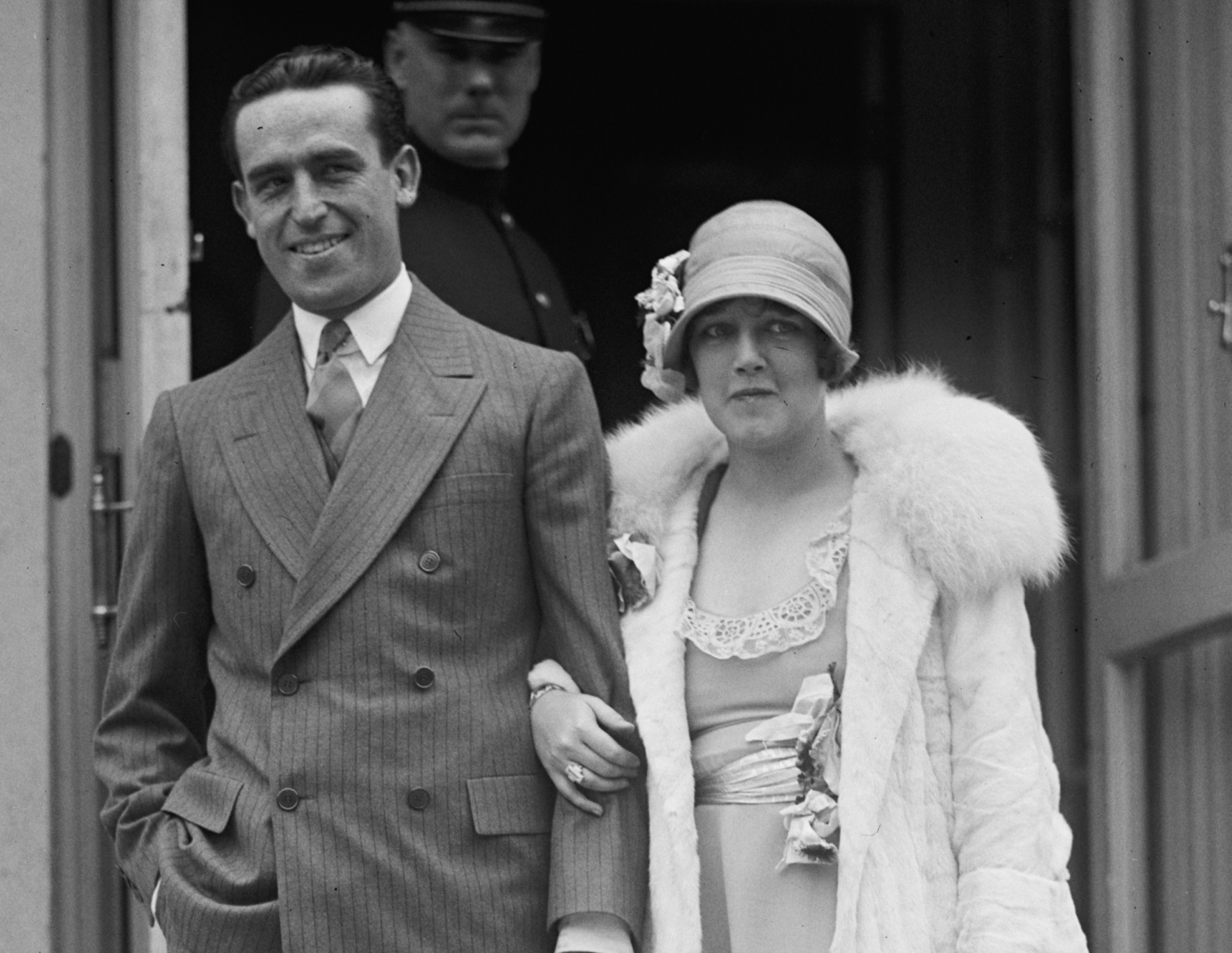 American movie actor Harold Lloyd and his wife Mildred Davis smiling on the street - 1925