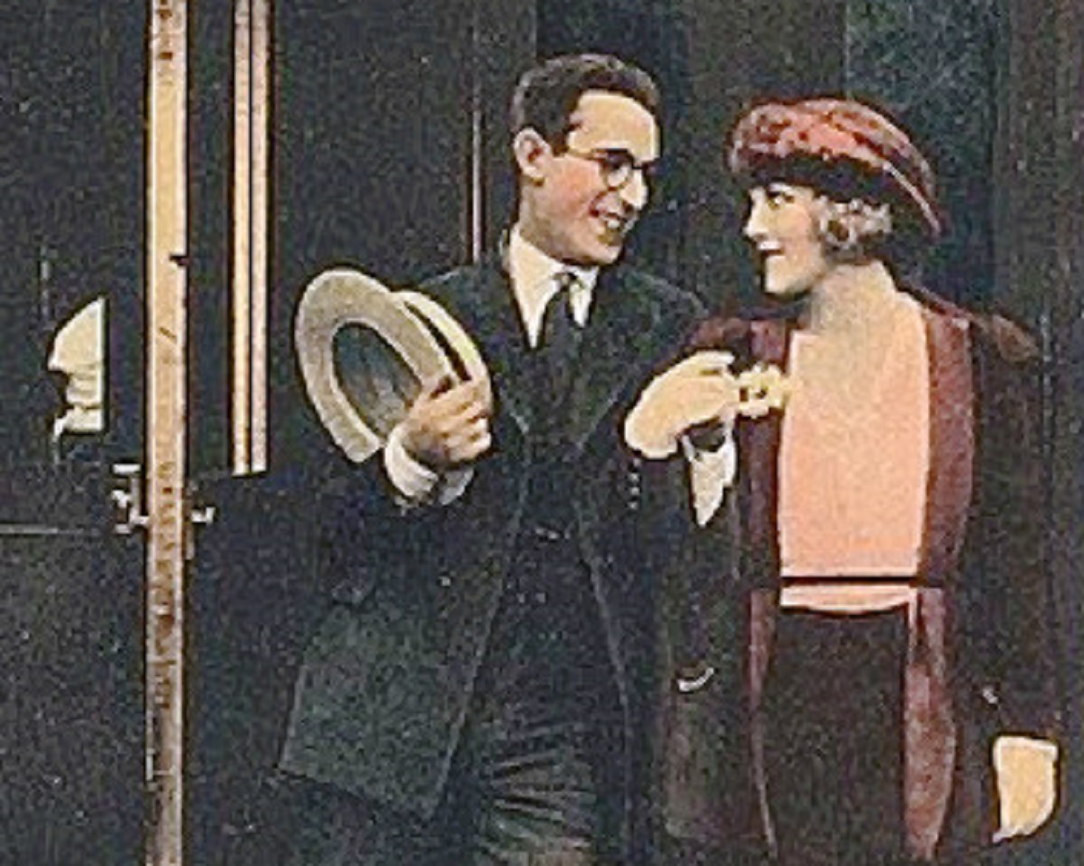Harold Lloyd wearing black suit - Lobby card for the 1920 film Number Please.  - 1920