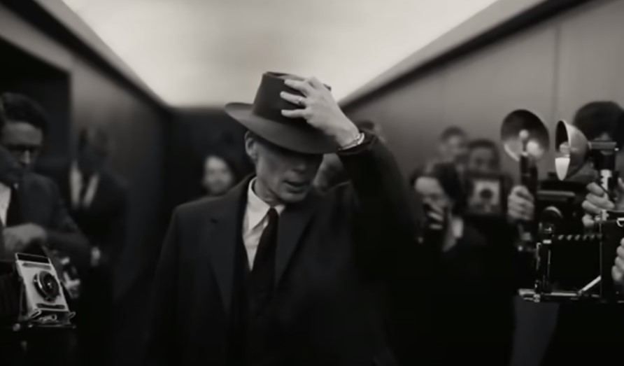 Cillian Murphy as Robert Oppenheimer in suit and hat