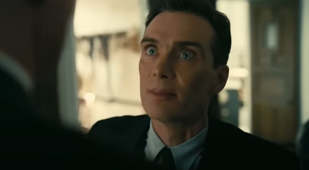 Cillian Murphy as Robert Oppenheimer in suit looking angry