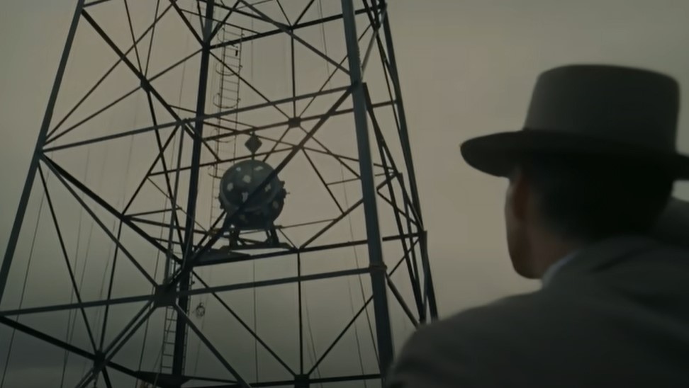 Cillian Murphy as Robert Oppenheimer in suit and hat