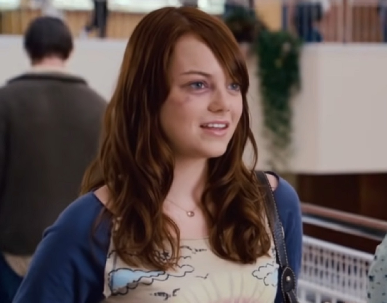 Screenshot: Emma Stone (Jules) looking a side and smiling - from Columbia Pictures , Superbad (2007)