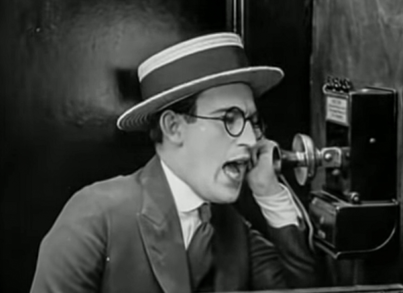 Screenshot B&W - Harold Lloyd talking on the telephone  - from Number Please (1920)