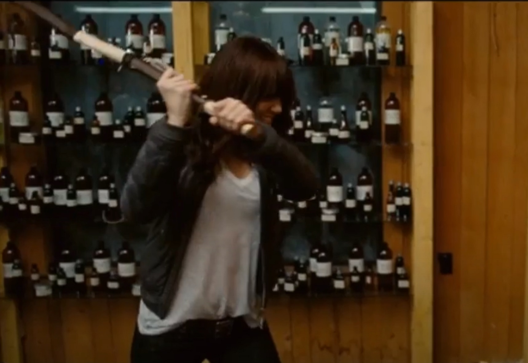 Screenshot: Emma Stone (Wichita) is braking things, looking mad - from  Zombieland (2009)