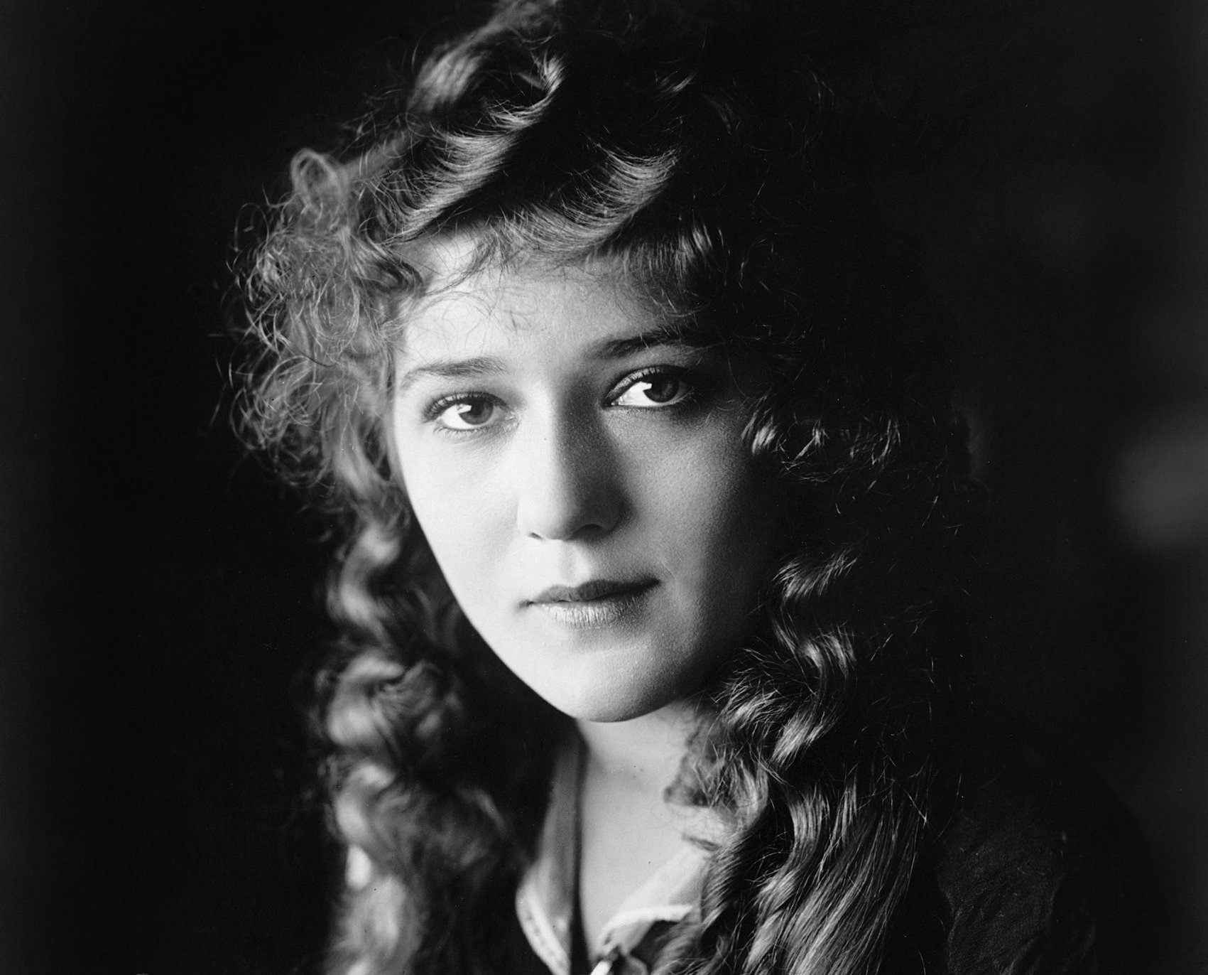 Mary Pickford on a black background