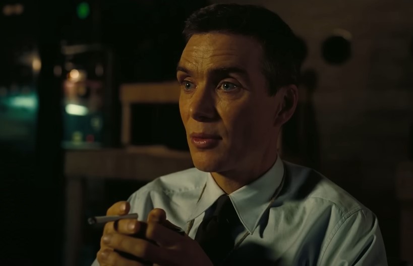 Cillian Murphy as Robert Oppenheimer in white shirt and tie