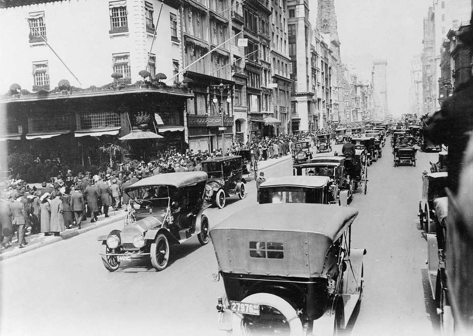 New York City 1913 image with cars driving on street