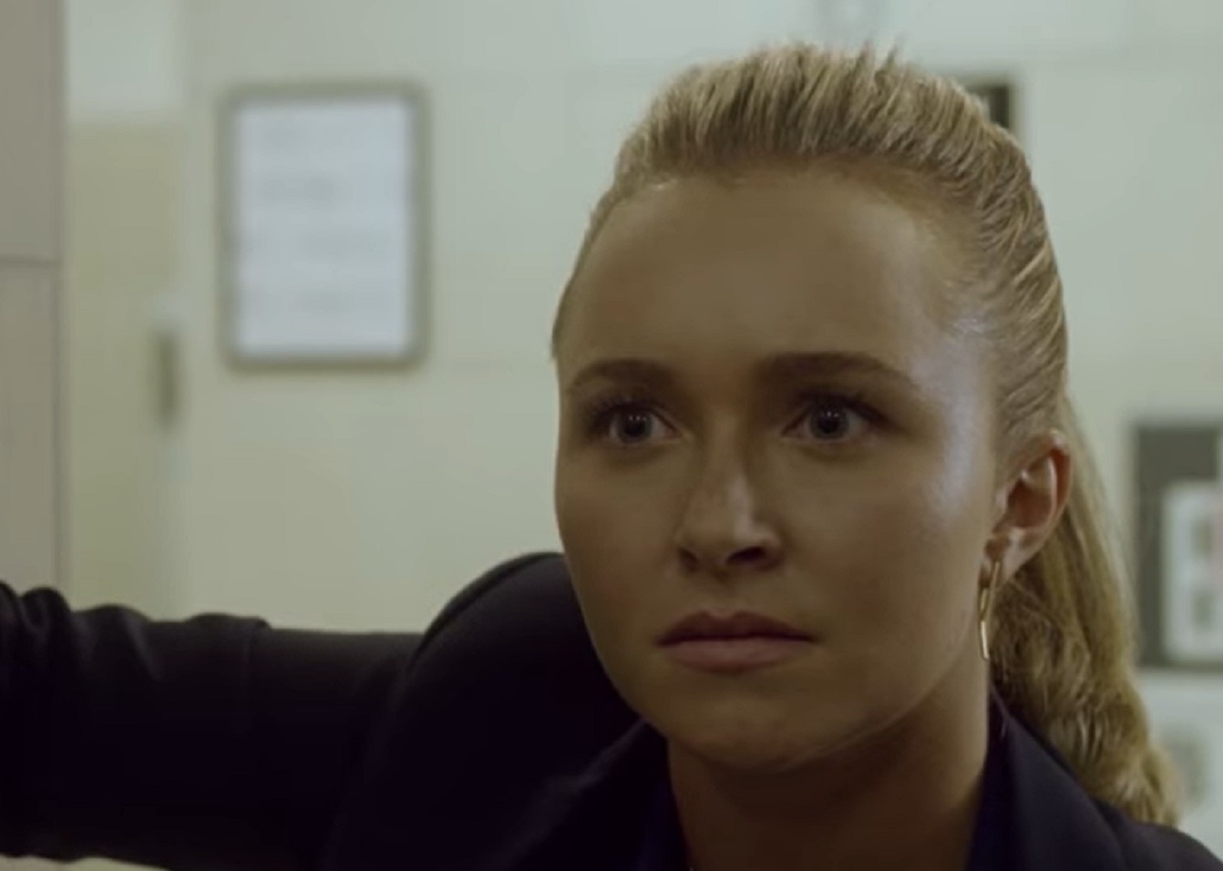 Screenshot: Hayden Panettiere wearing black suit looking upset at side - From Custody  2016