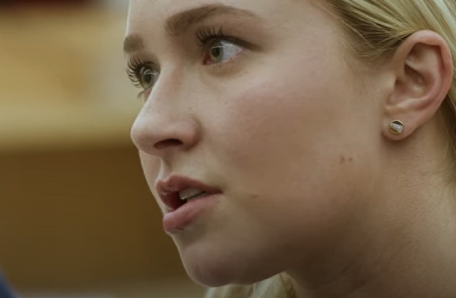 Screenshot: Hayden Panettiere close up face shot looking upset - from Custody 2016