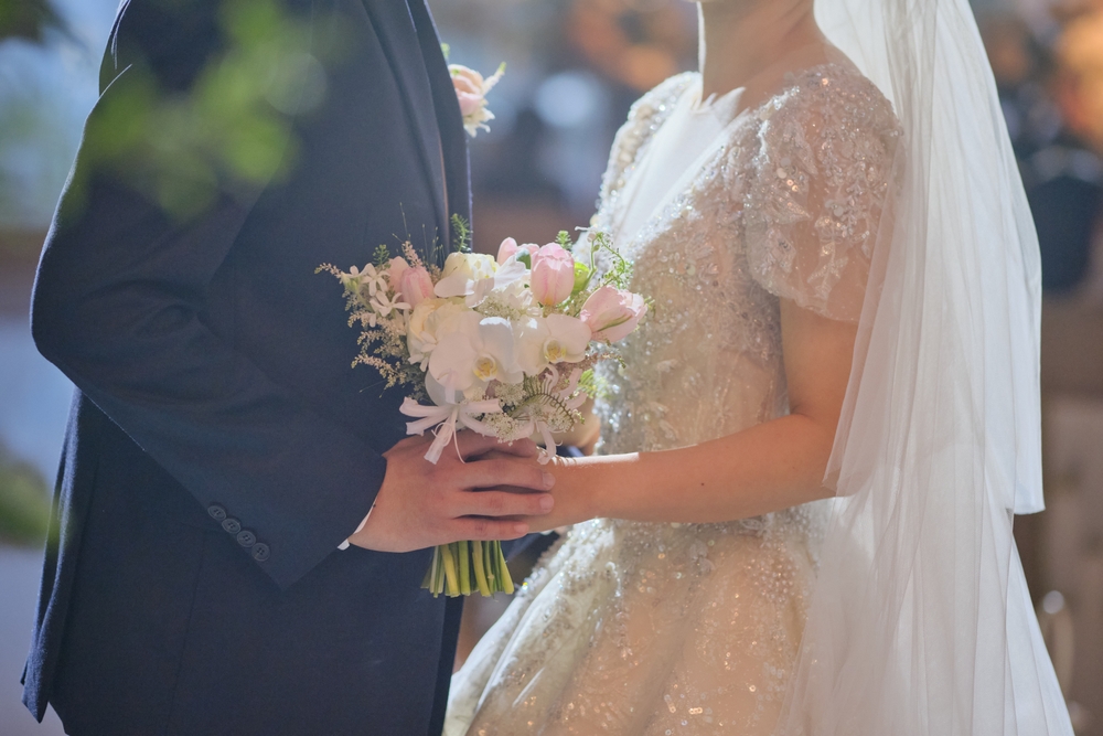 Bride and groom looking at each other
