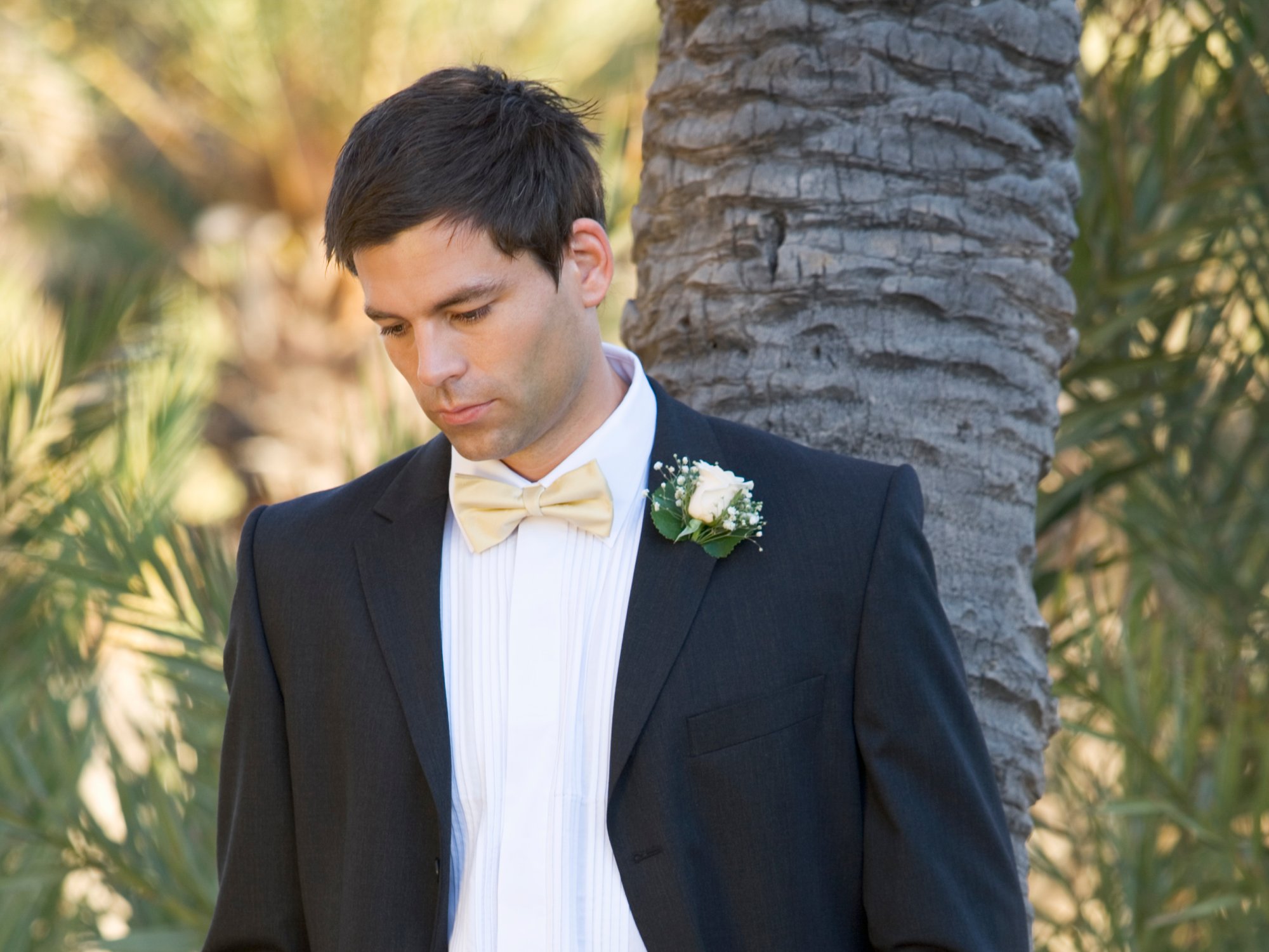 A sad groom waiting for the bride