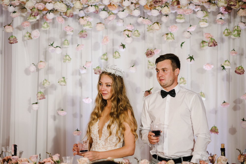 Bride and groom sad and crying