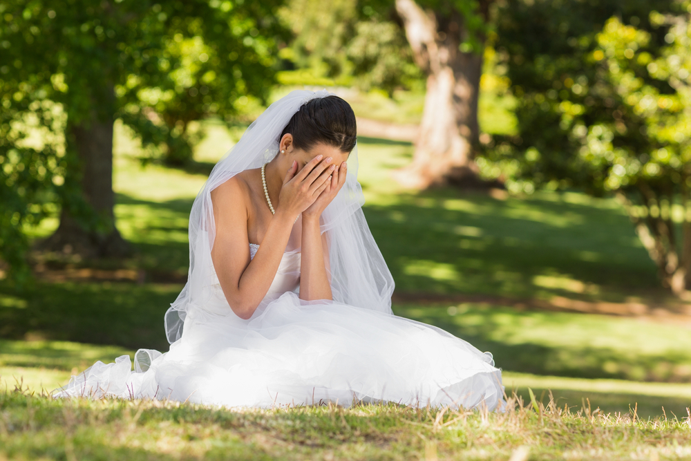 View of a beautiful worried bride