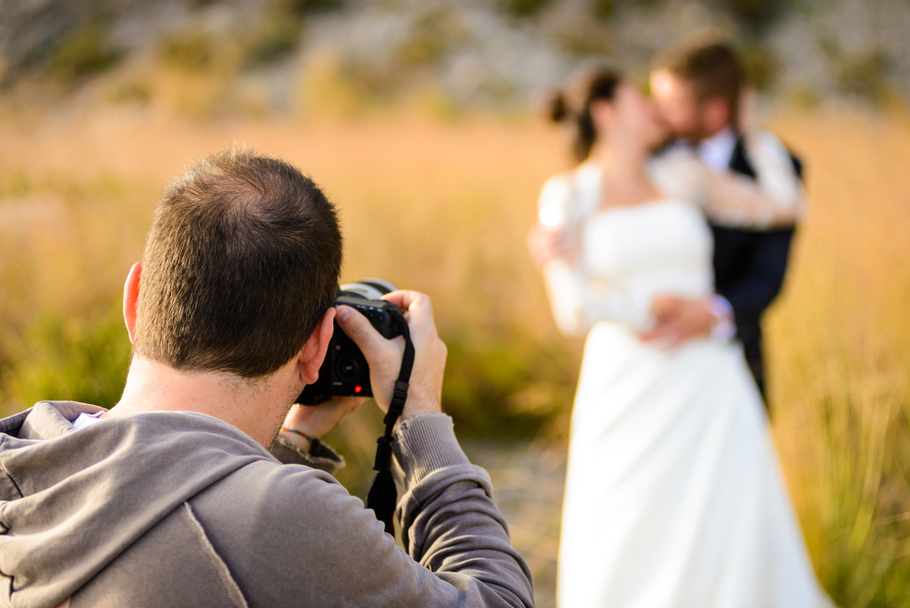 Wedding photographer taking photographs