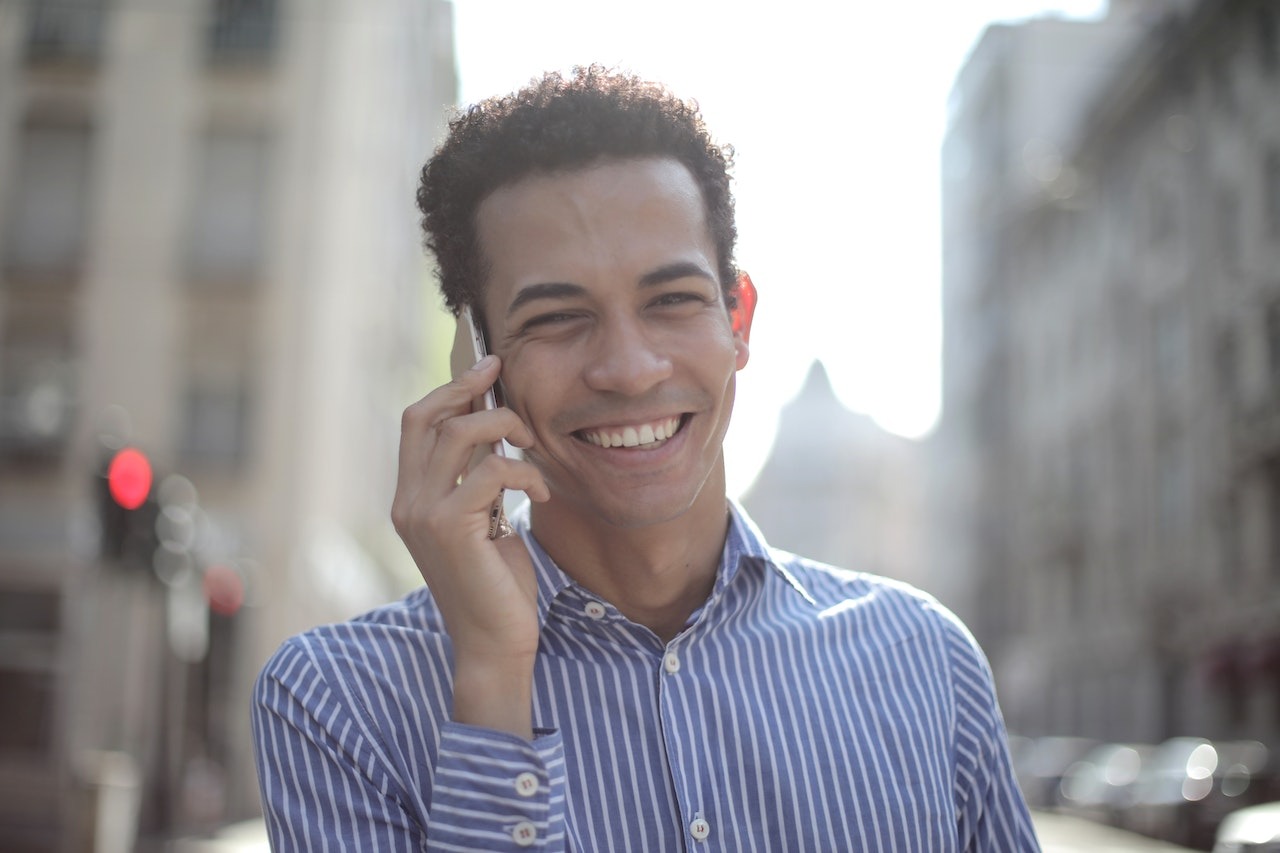 Young man talking on the cell phone.