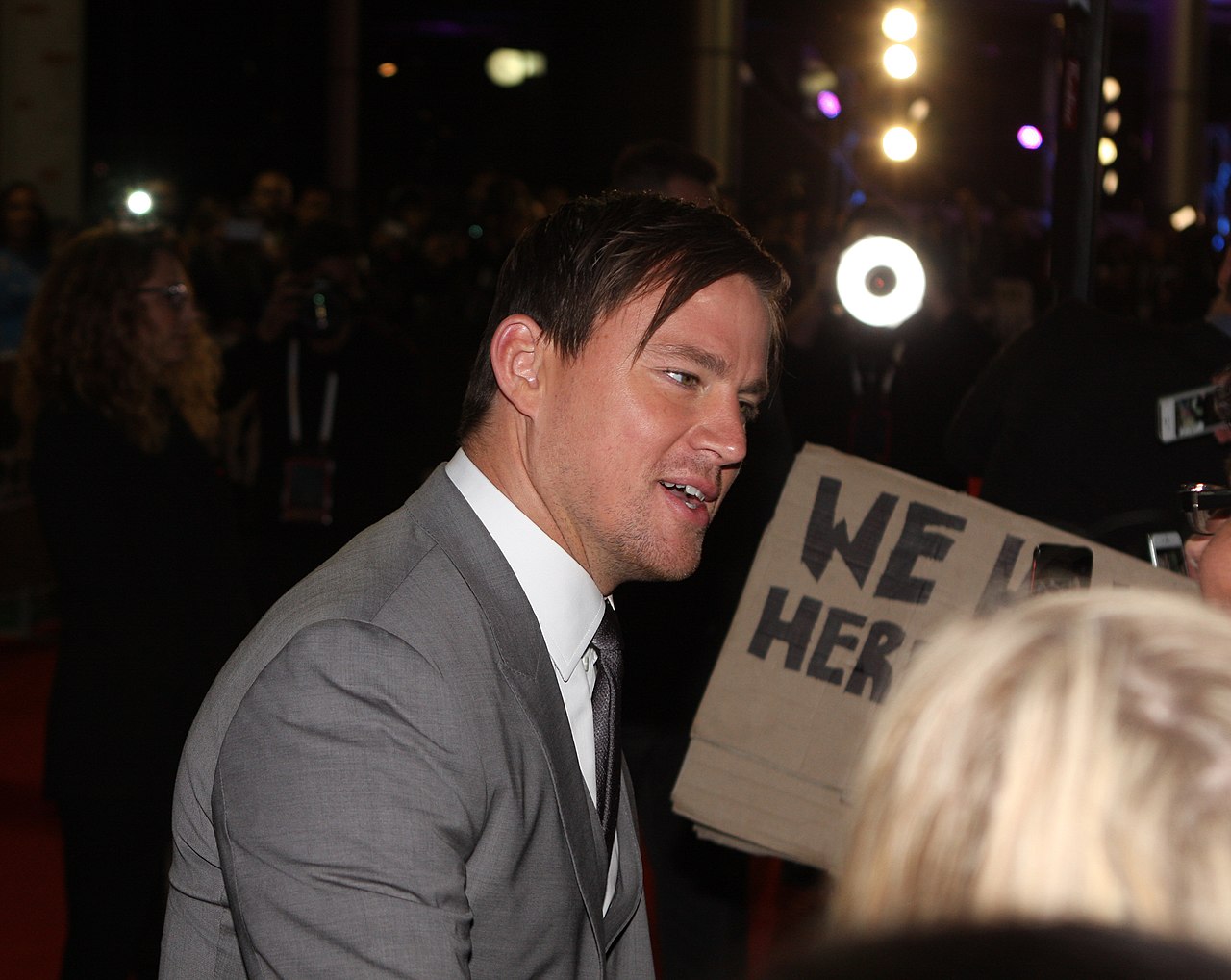 Channing Tatum at a  Premiere of Magic Mike XXL in gray suit