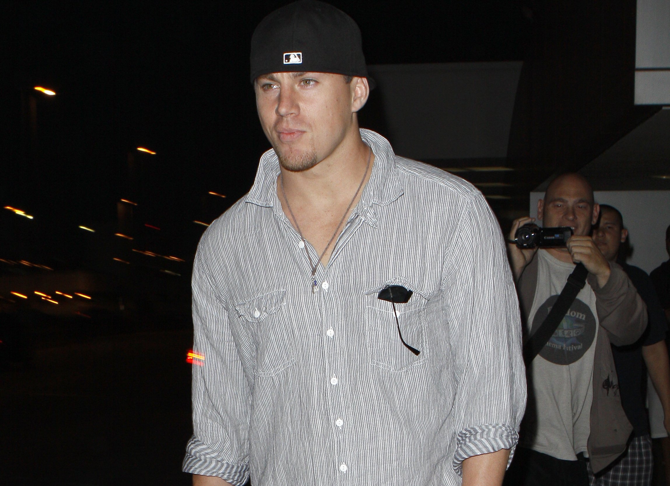 Actor Channing Tatum is seen at LAX. July 1, 2010 in Los Angeles, California in gray shirt and a hat