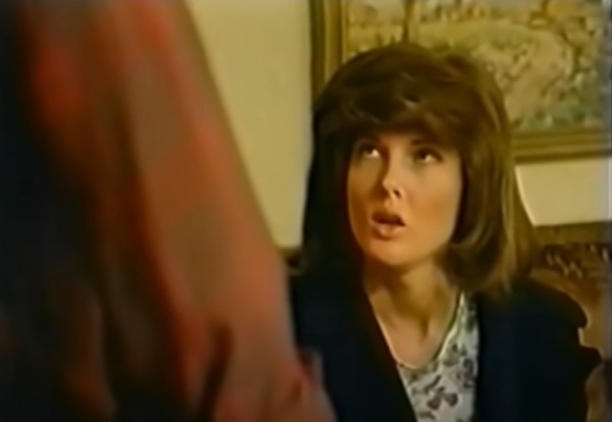 Annette O'Toole as Tammy Wynette in Stand by Your Man in black jacket