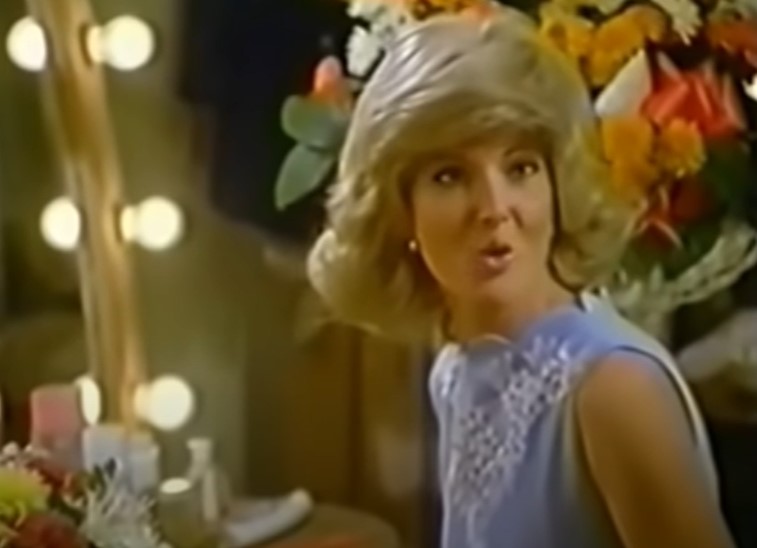 Annette O'Toole as Tammy Wynette in Stand by Your Man speaking to someone