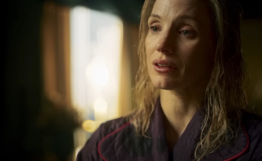 Jessica Chastain as Tammy Wynette looking sad