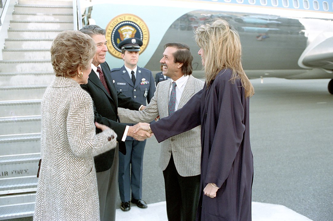 President Ronald Reagan and First Lady Nancy Reagan are greeted by Sonny Bono and Mary Bono