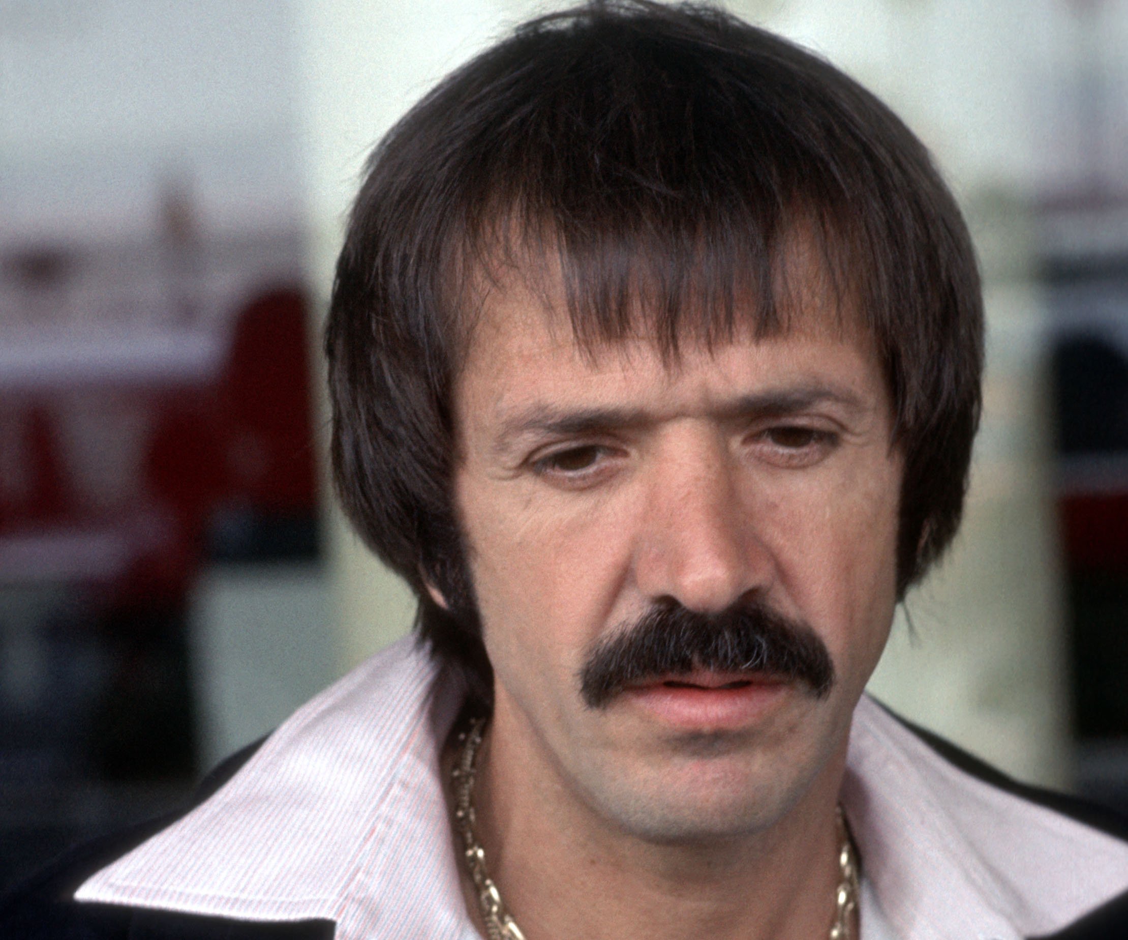 Singer Sonny Bono on June 12, 1977 looking sad in suit and gold chains