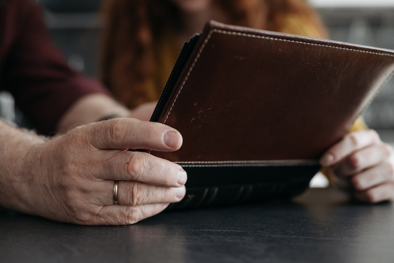 Brown leather album on the table.