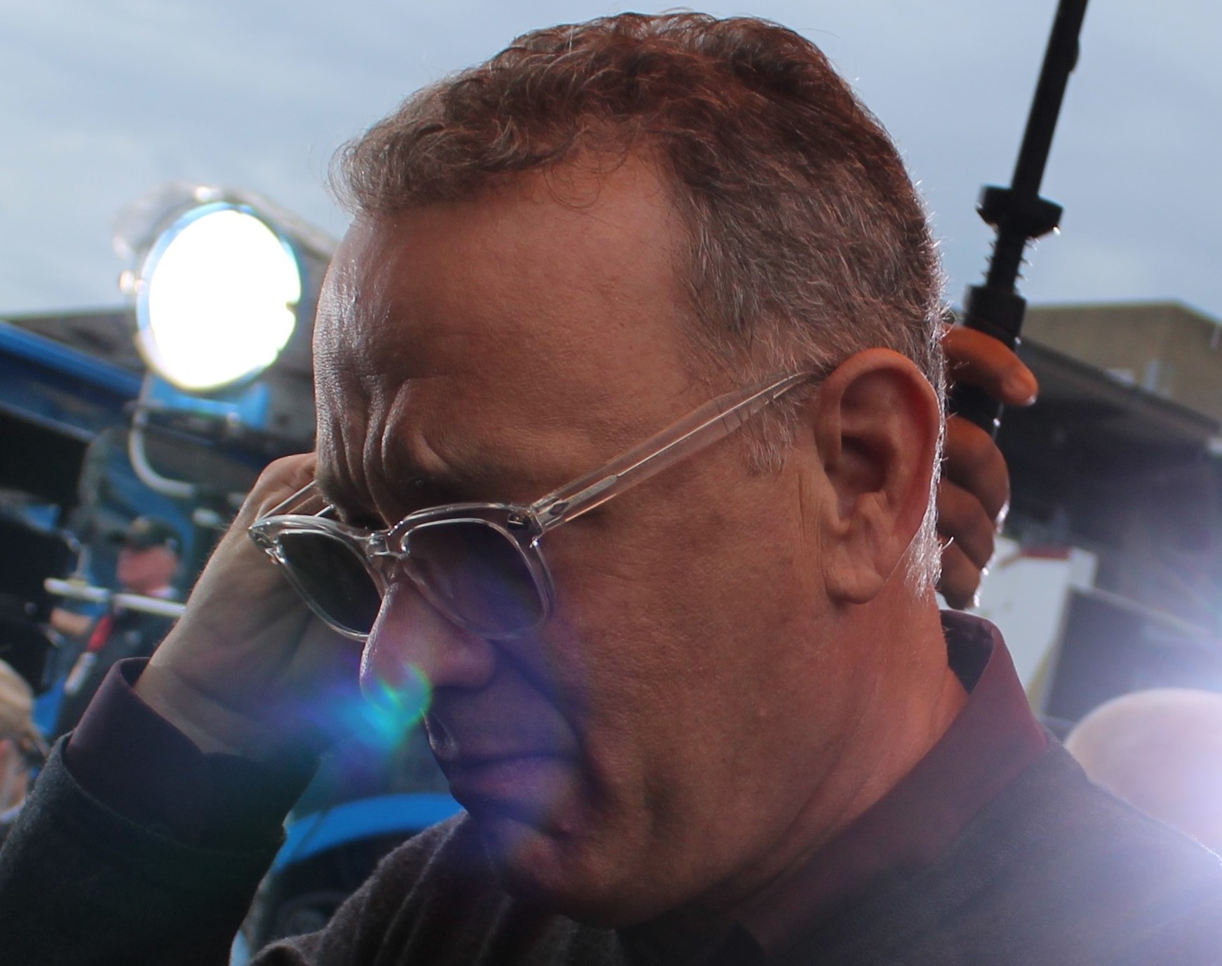 Portrait Photo of American actor and filmmaker Tom Hanks wearing sunglasses