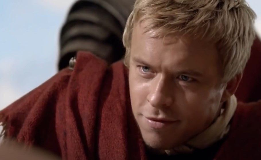 Julius Caesar, as depicted in Spartacus in red roman clothes