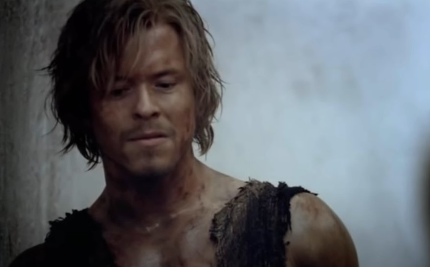 Julius Caesar, as depicted in Spartacus in torn  roman clothes