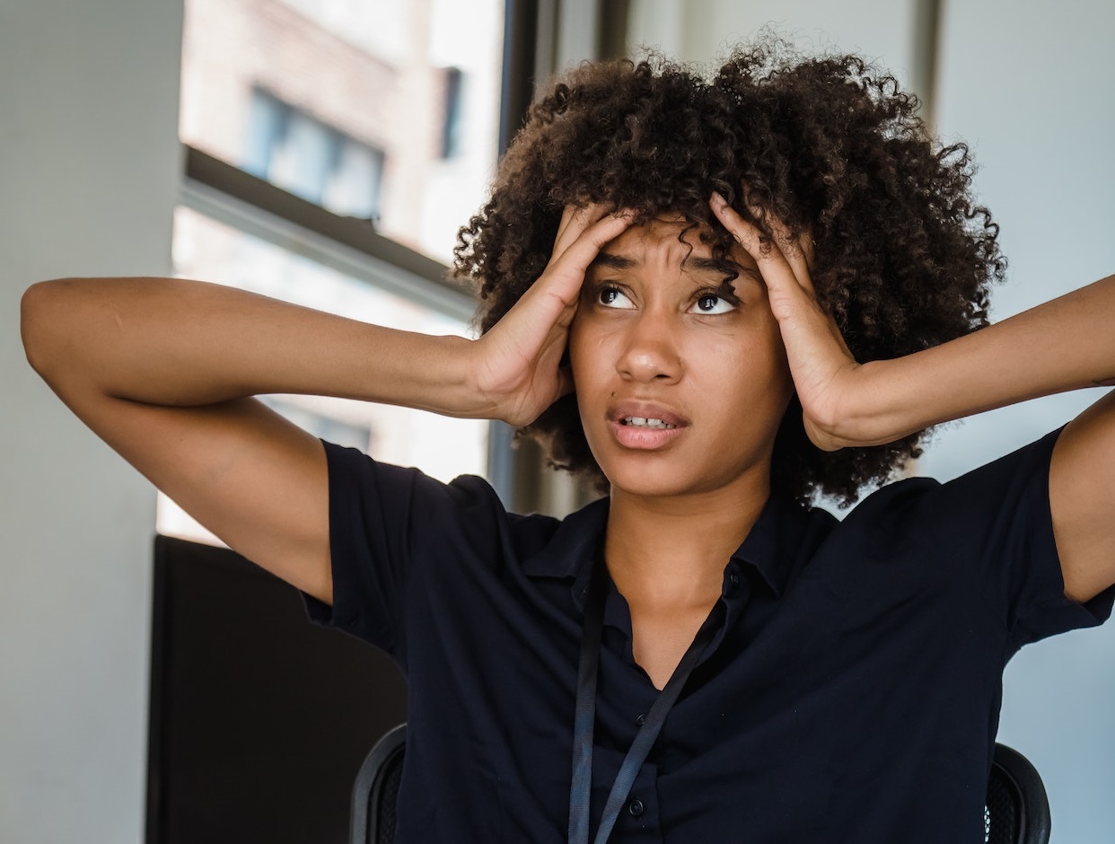 Young woman is feeling stressed.