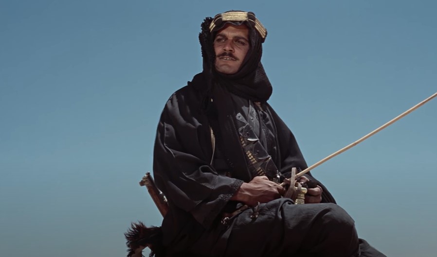 Omar Sharif in Lawrence of Arabia on a camel at desert