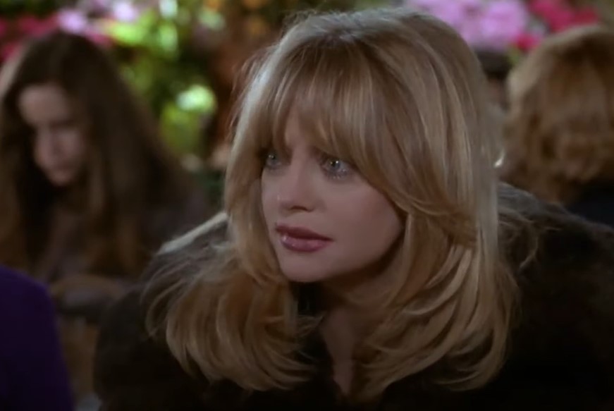 Goldie Hawn in The First Wives Club at a restaurant in fur coat