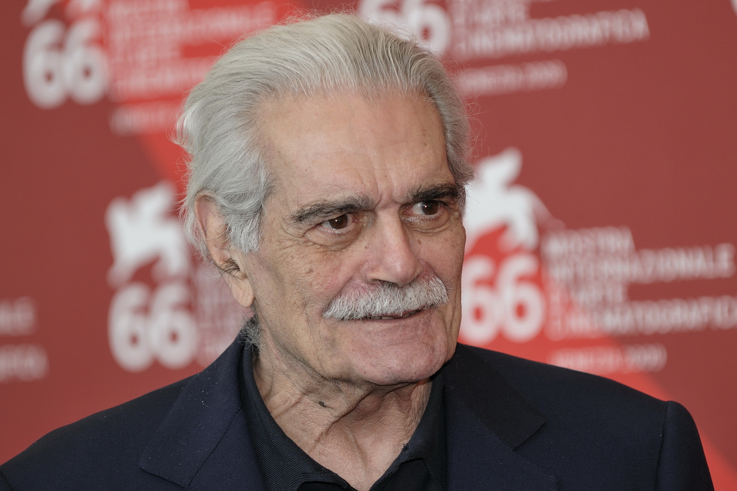 Omar Sharif at Venice Festival in dark suit