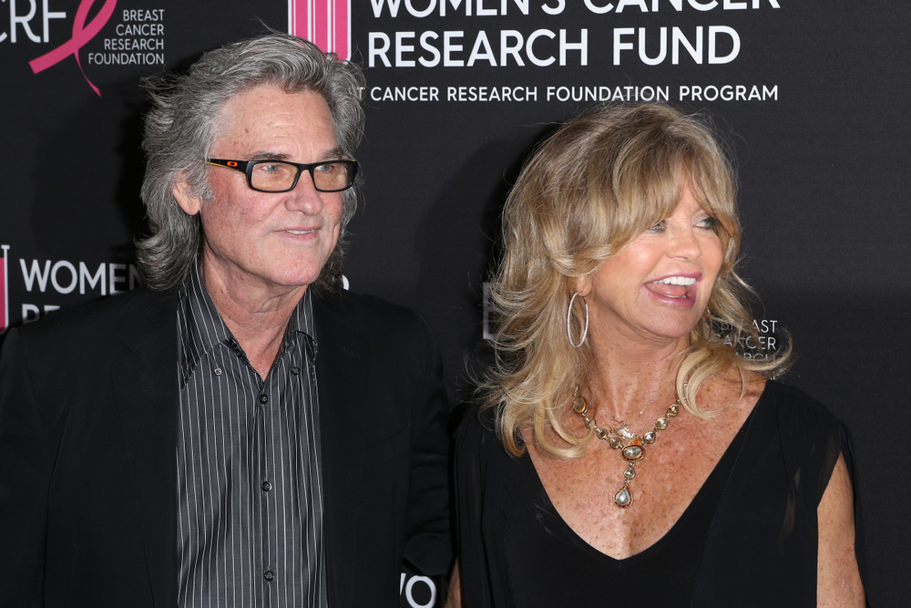 Kurt Russell, Goldie Hawn in black clothes
