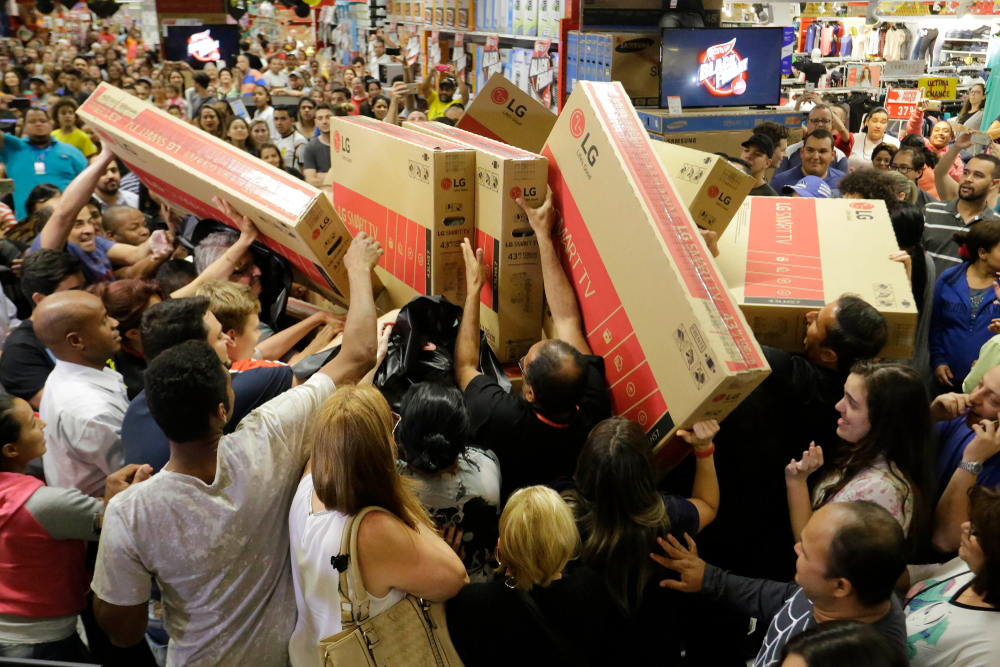 Shoppers rush to buy televisions during a Black Friday